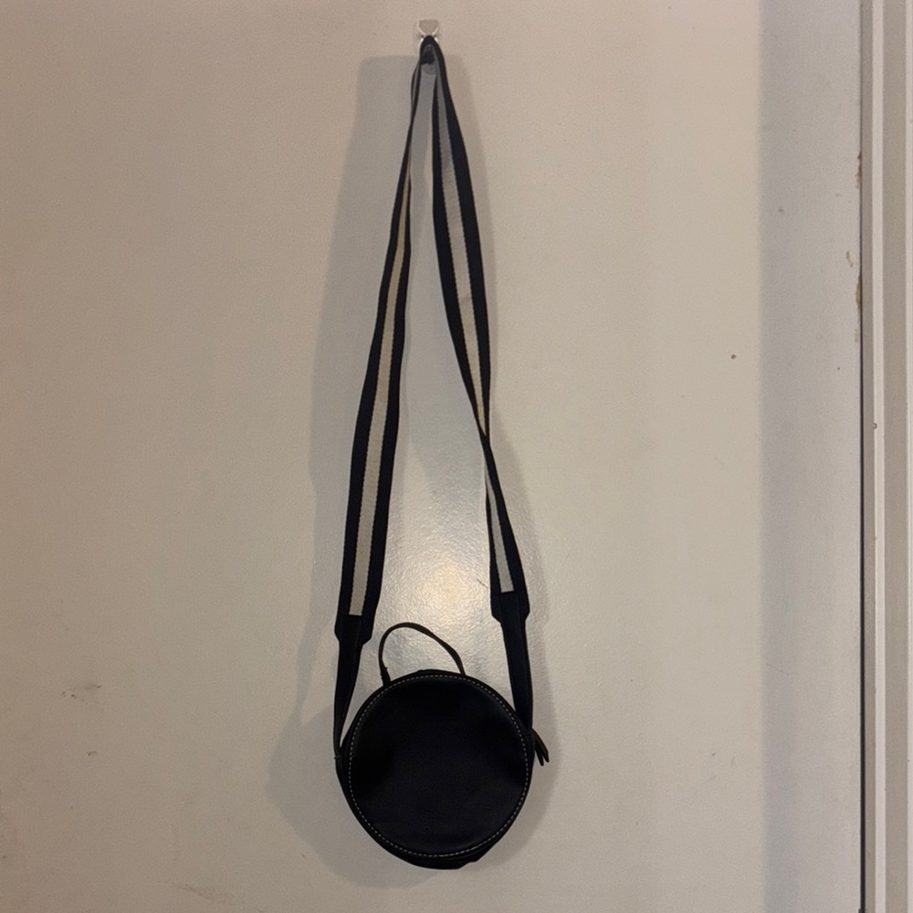 Black Round Crossbody Bag with Textured Design